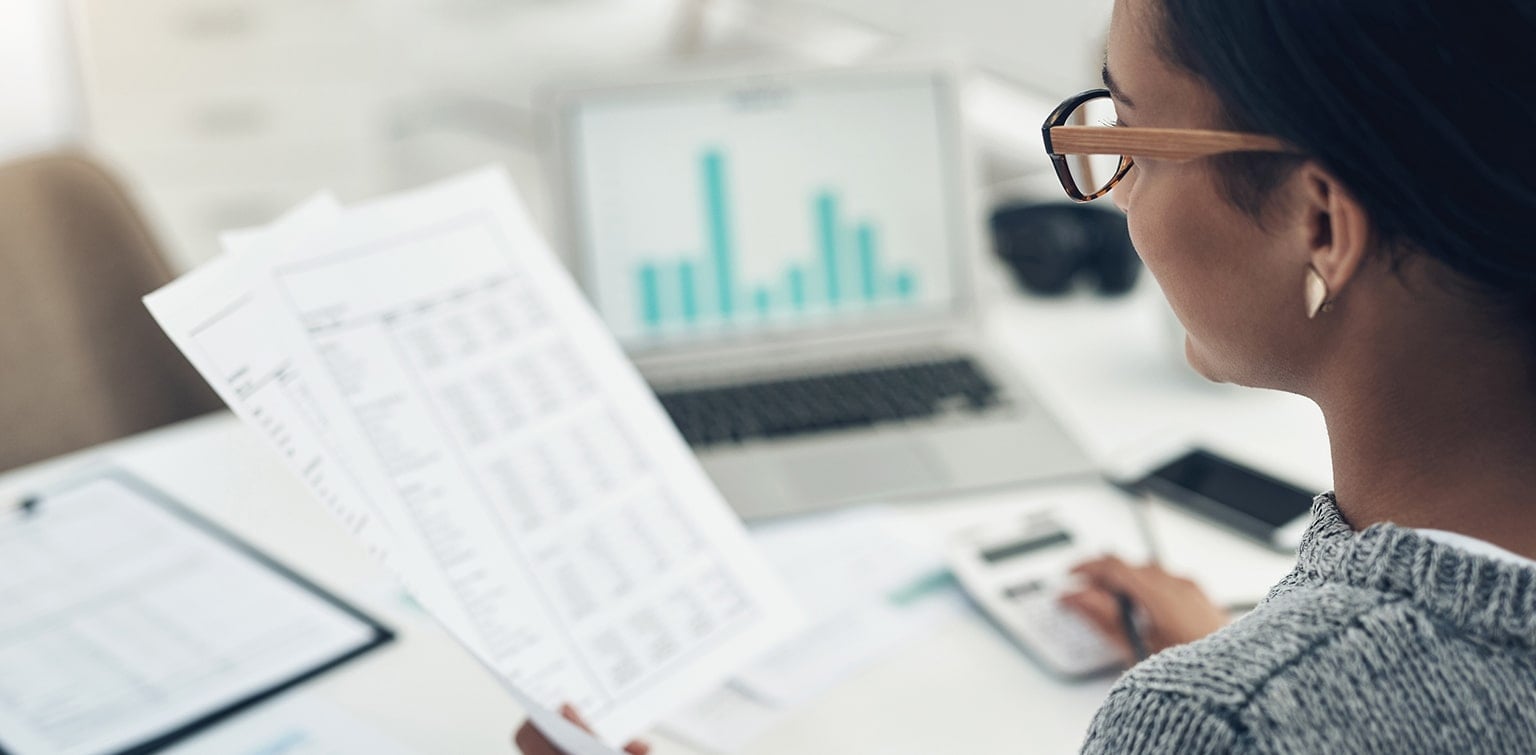 Female business owner reviewing financial documents