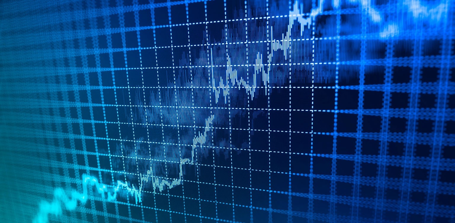 Digital screen displaying upward-trending statistical data