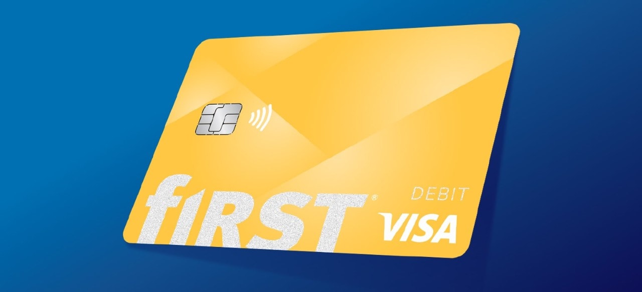 First Financial Visa debit card on blue background